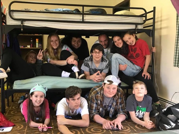Youth group members on bunk bed